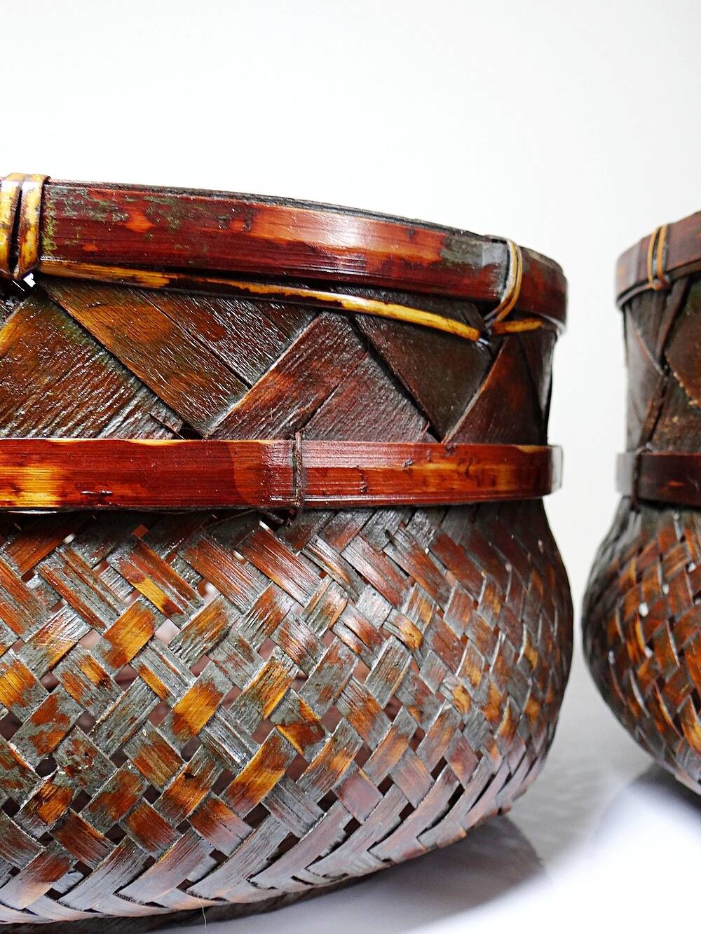 Pair of vintage nesting handmade Japanese woven bamboo baskets