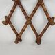 Bamboo-style wooden accordion coat rack