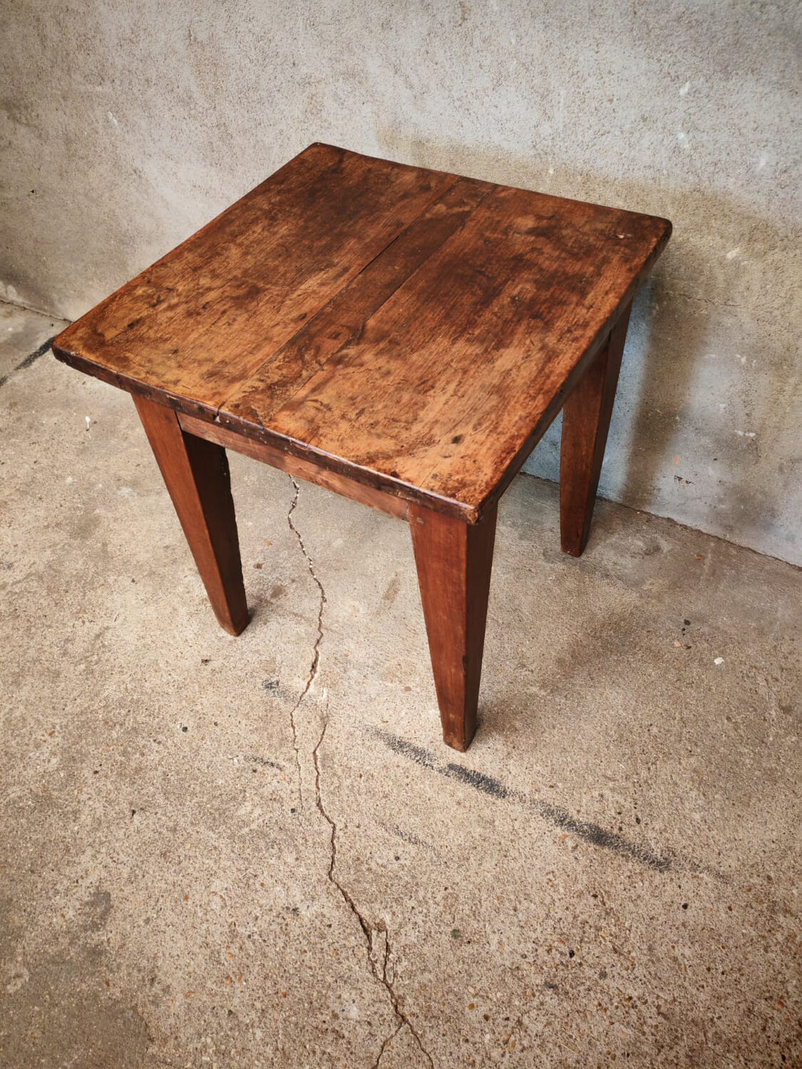 Small farmhouse table, low and square.