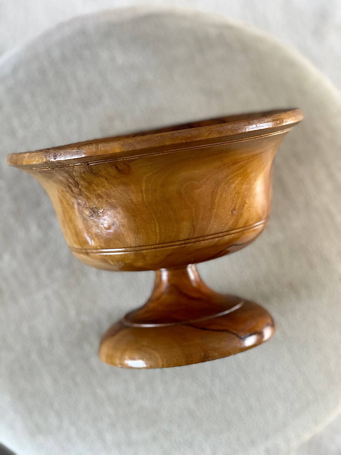 Empty pocket in olive wood