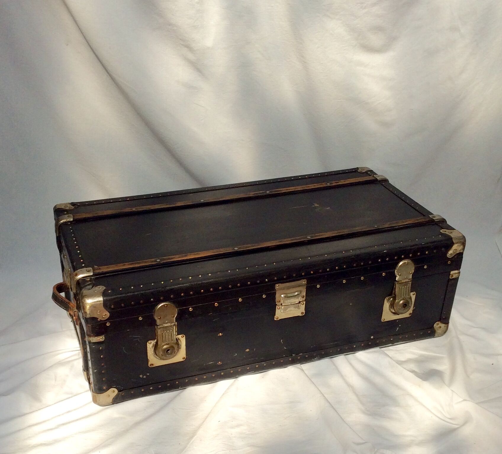 Old wooden and leather trunk