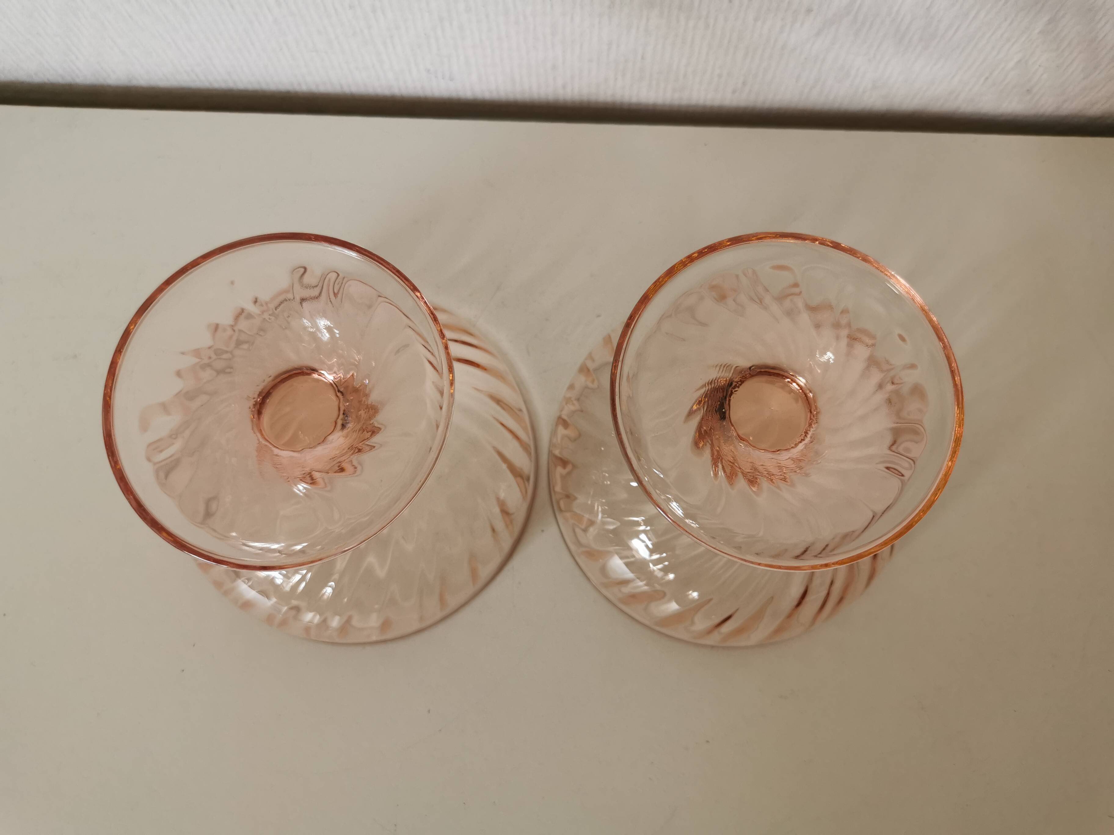 Pair of pink rosaline swirl glass fruit bowls