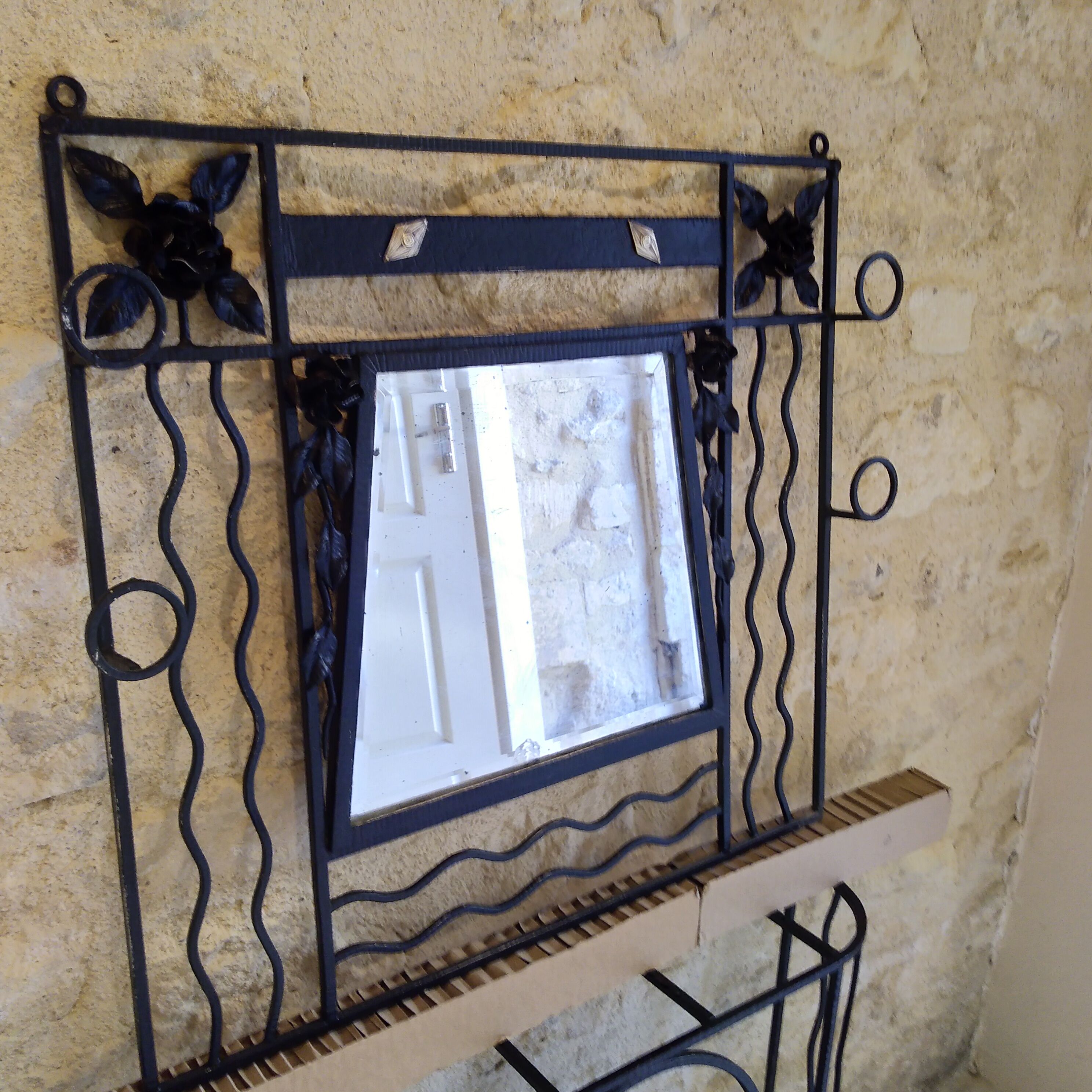 Art deco wrought iron coat holder