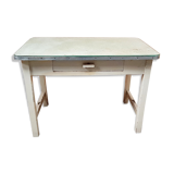 Old desk table with glass plate and drawer
