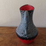 red and gray pitcher