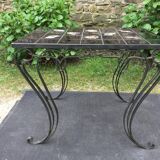 Vintage ceramic coffee table by Guy Trévoux with wrought iron base.