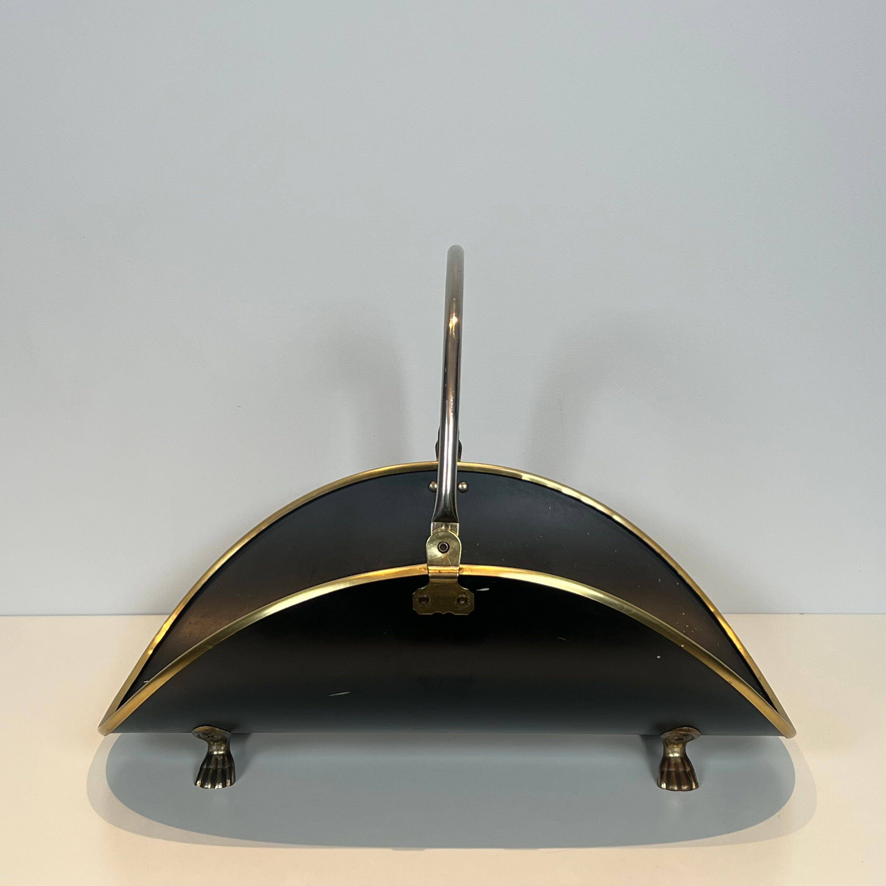Neoclassical log holder in brass and black lacquered brass