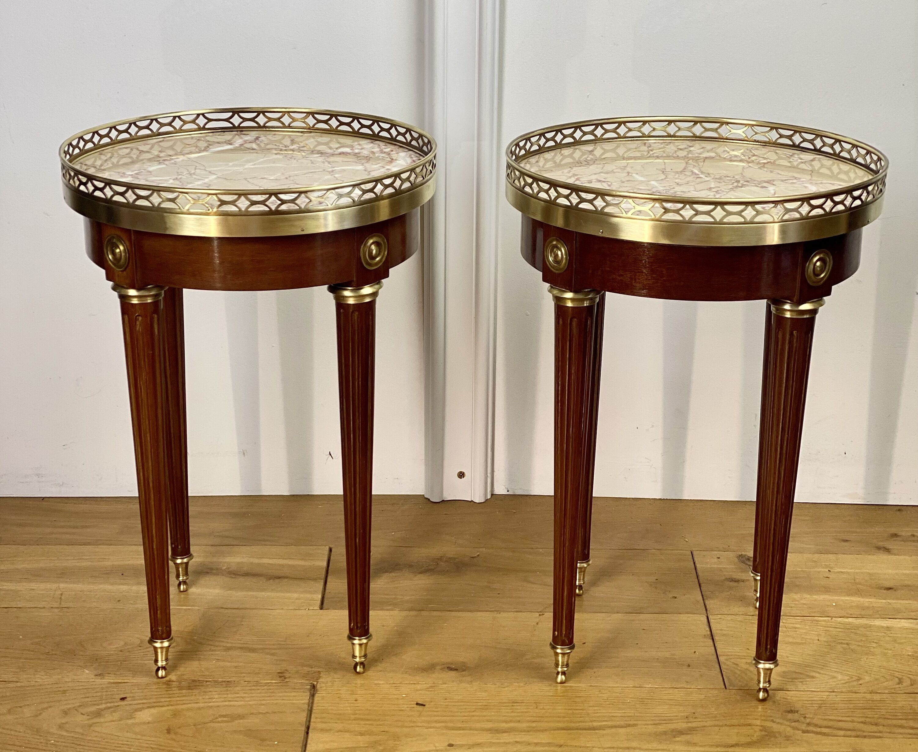 Pair of old pedestals stamped " h.j.l.rossenu " in mahogany over marble