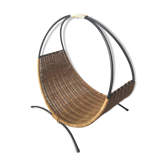 Rattan basket with logs