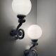 Cast iron and opaline wall lights from the 70s