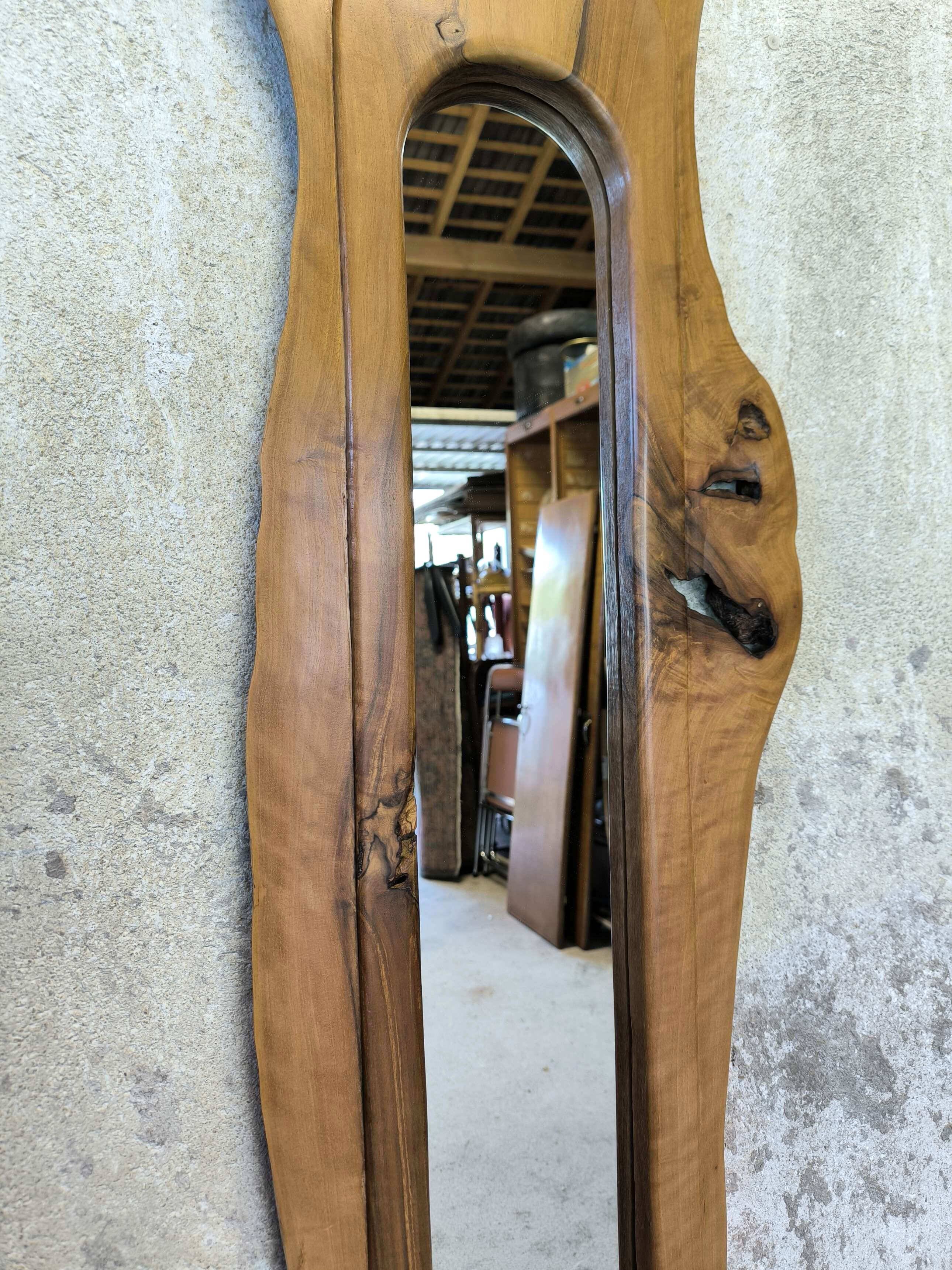 Vintage free-form mirror in solid wood.