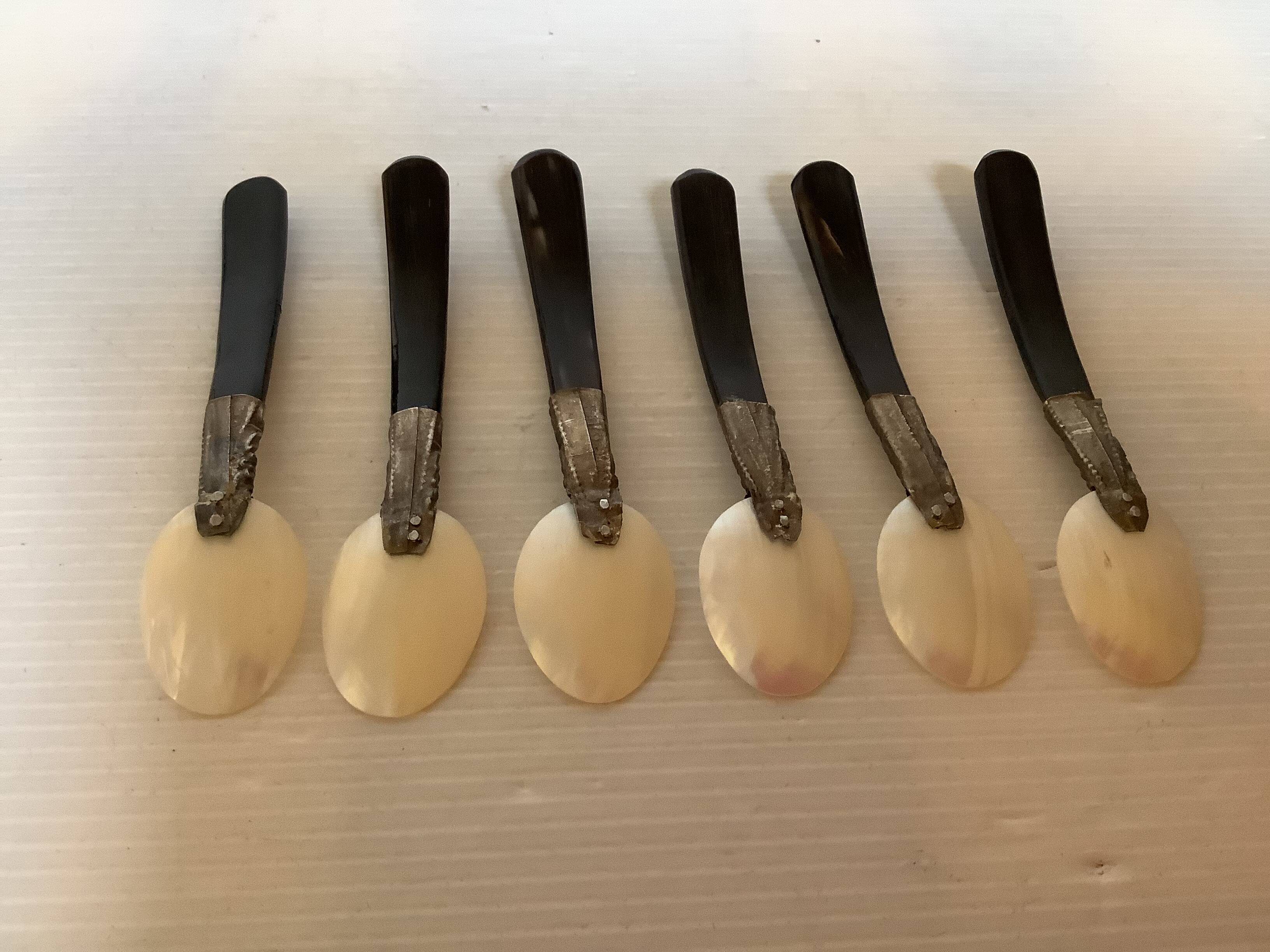 Six antique mother-of-pearl caviar spoons