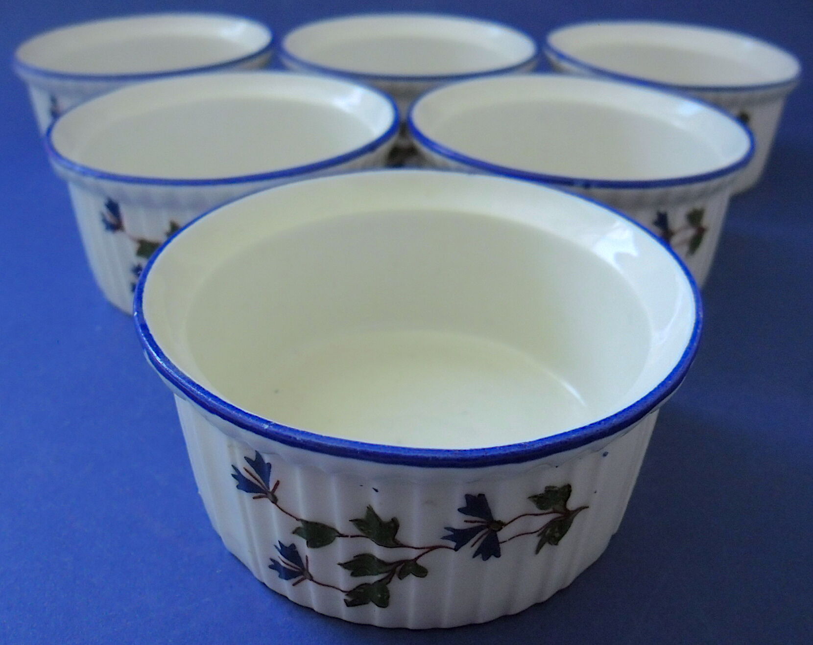 Suite of six porcelain ramekins decorated with barbels