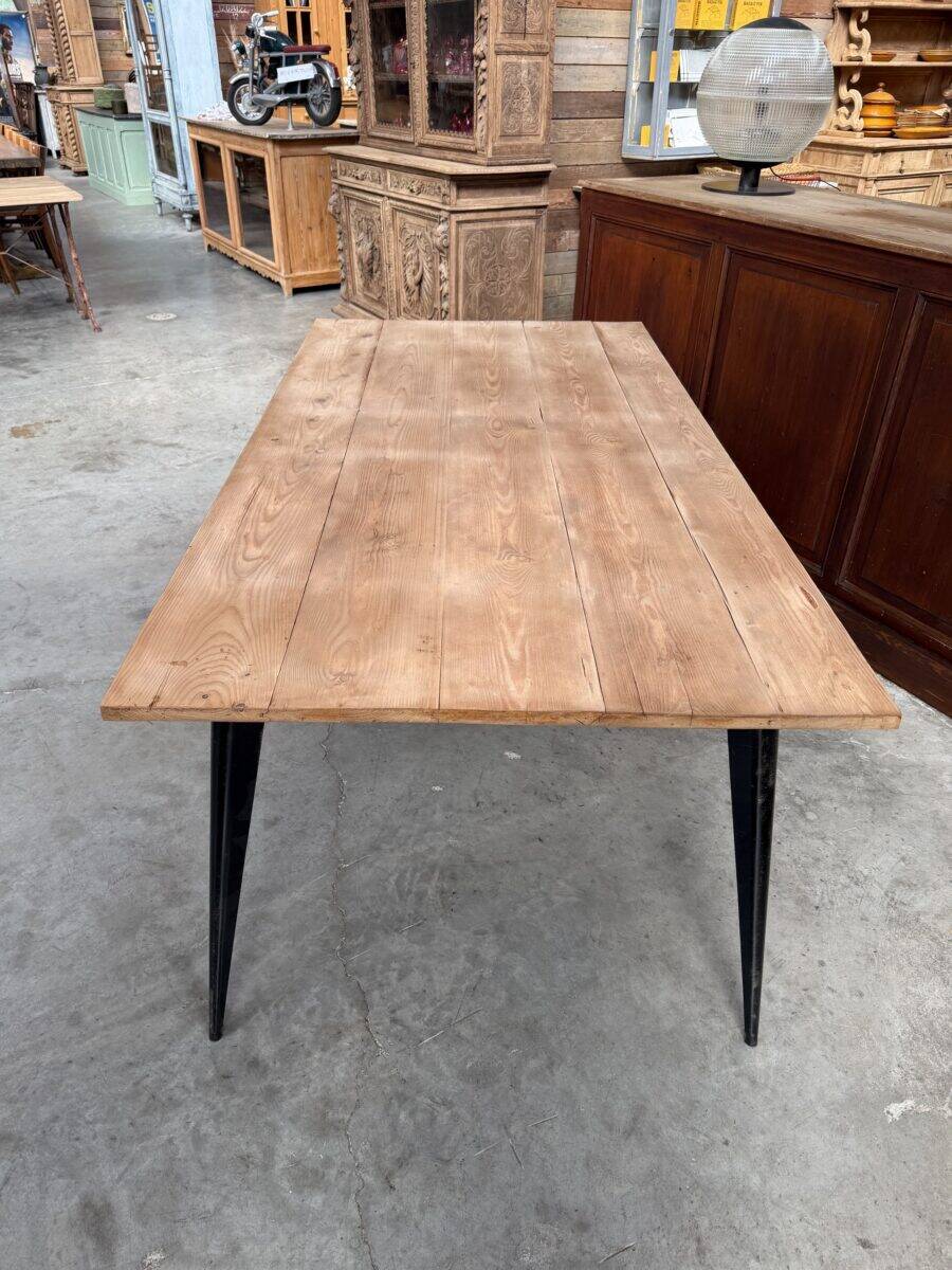Old fir table with Tolix legs.