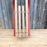 Red sled in metal and wood in the 1960s