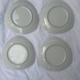 Set of 4 triangular dessert plates.