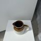 Small two-tone white and brown pitcher Made in China