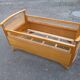 Baby cot in oak and wicker