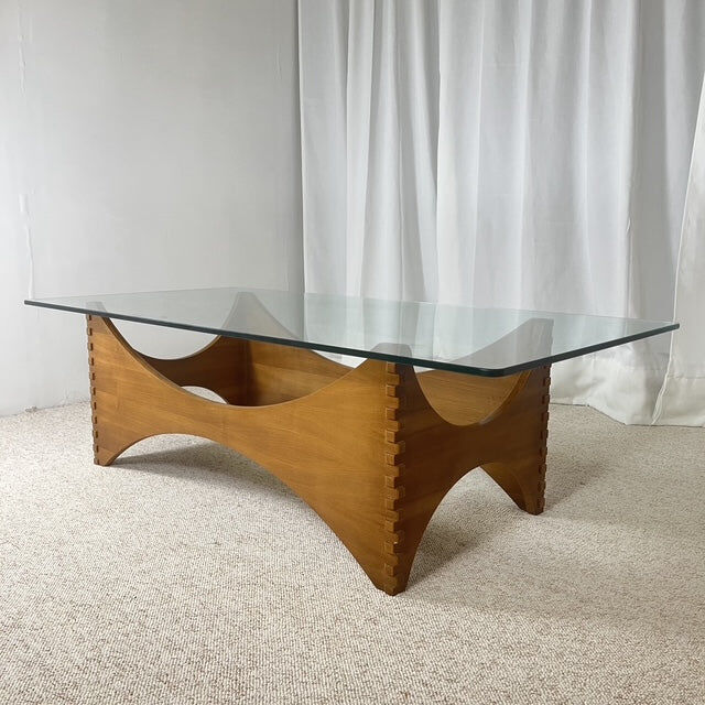 Sculptural coffee table in mahogany and glass – Europe, 1970s
