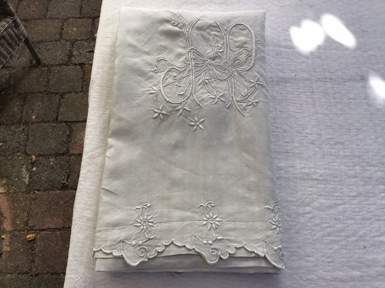 Embroidered linen sheet marked "JP"