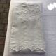 Embroidered linen sheet marked "JP"
