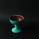 Cup on a pedestal or chalice in cloudy lagoon green glazed terracotta