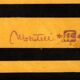 1980s Italian coffee table in black and yellow lacquered wood