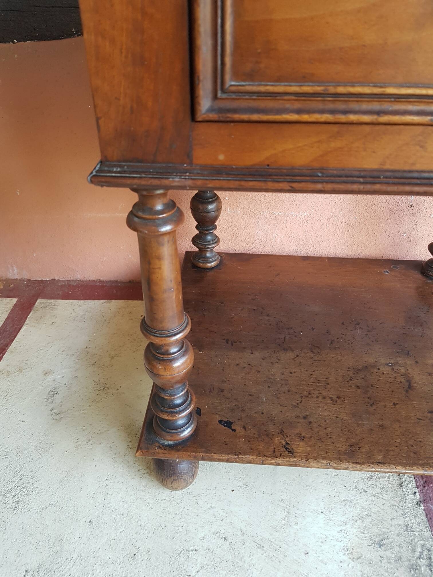 Old wooden marble bedside table