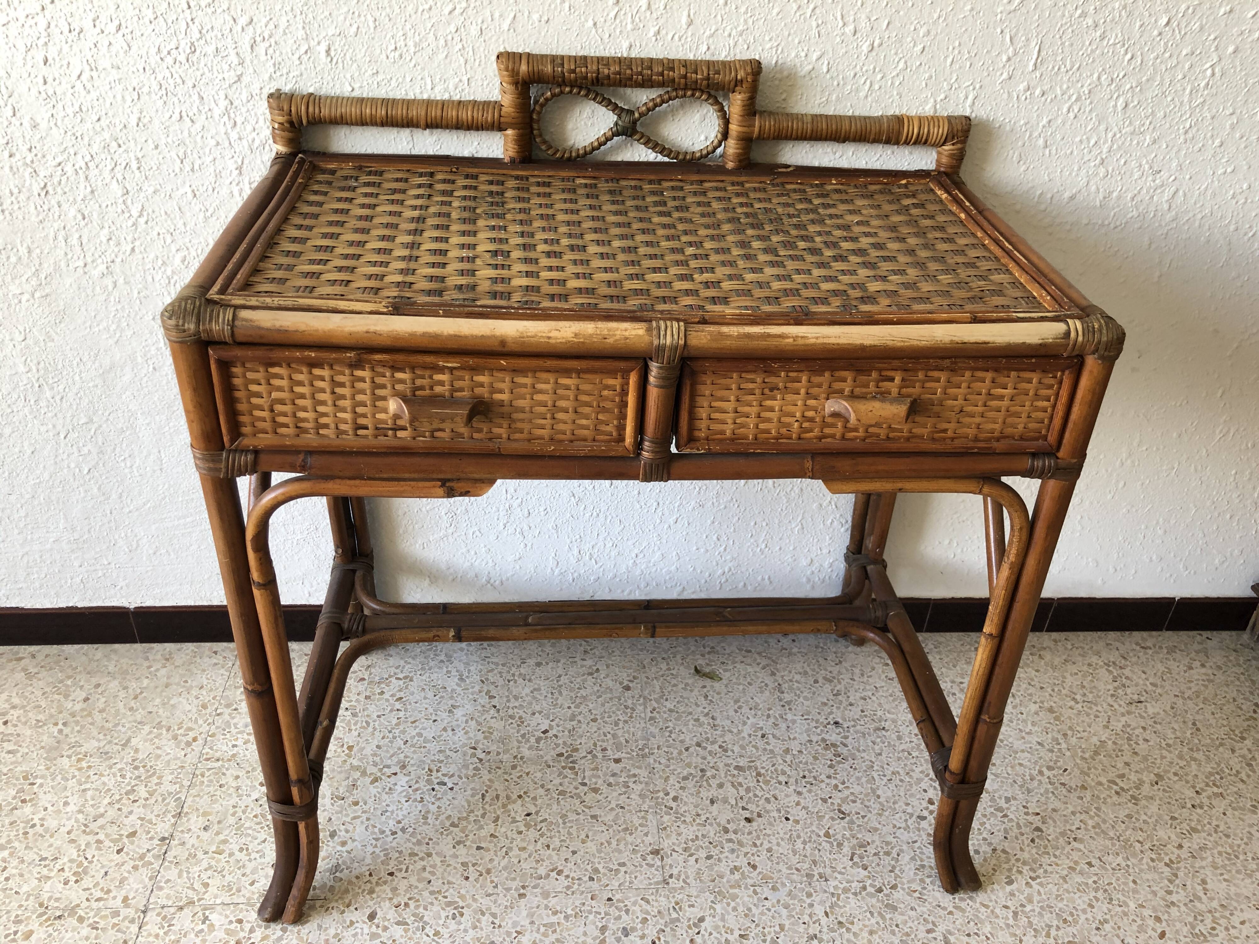 Console/small old desk in rattan
