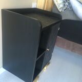 Black and gold Art Deco bedside table