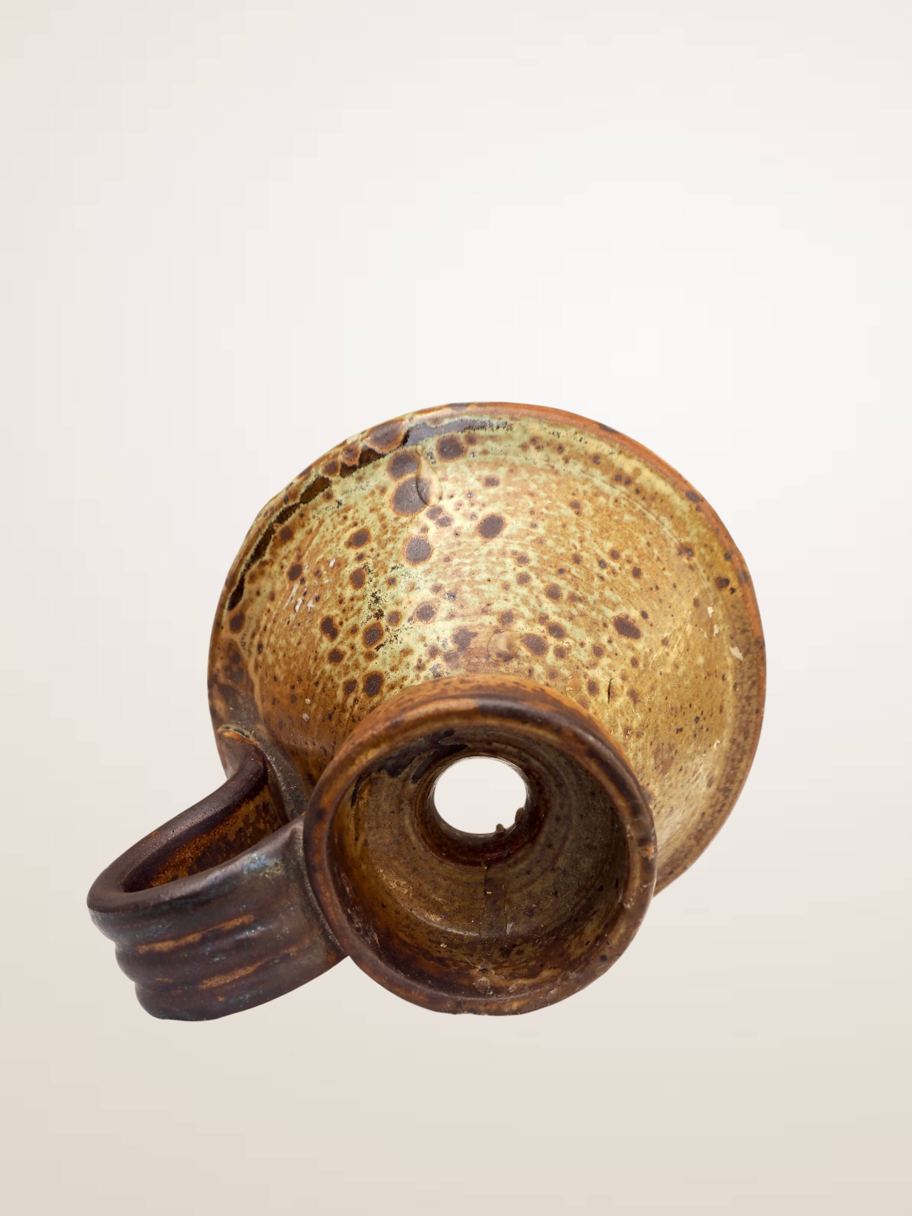 Handcrafted stoneware candle holder