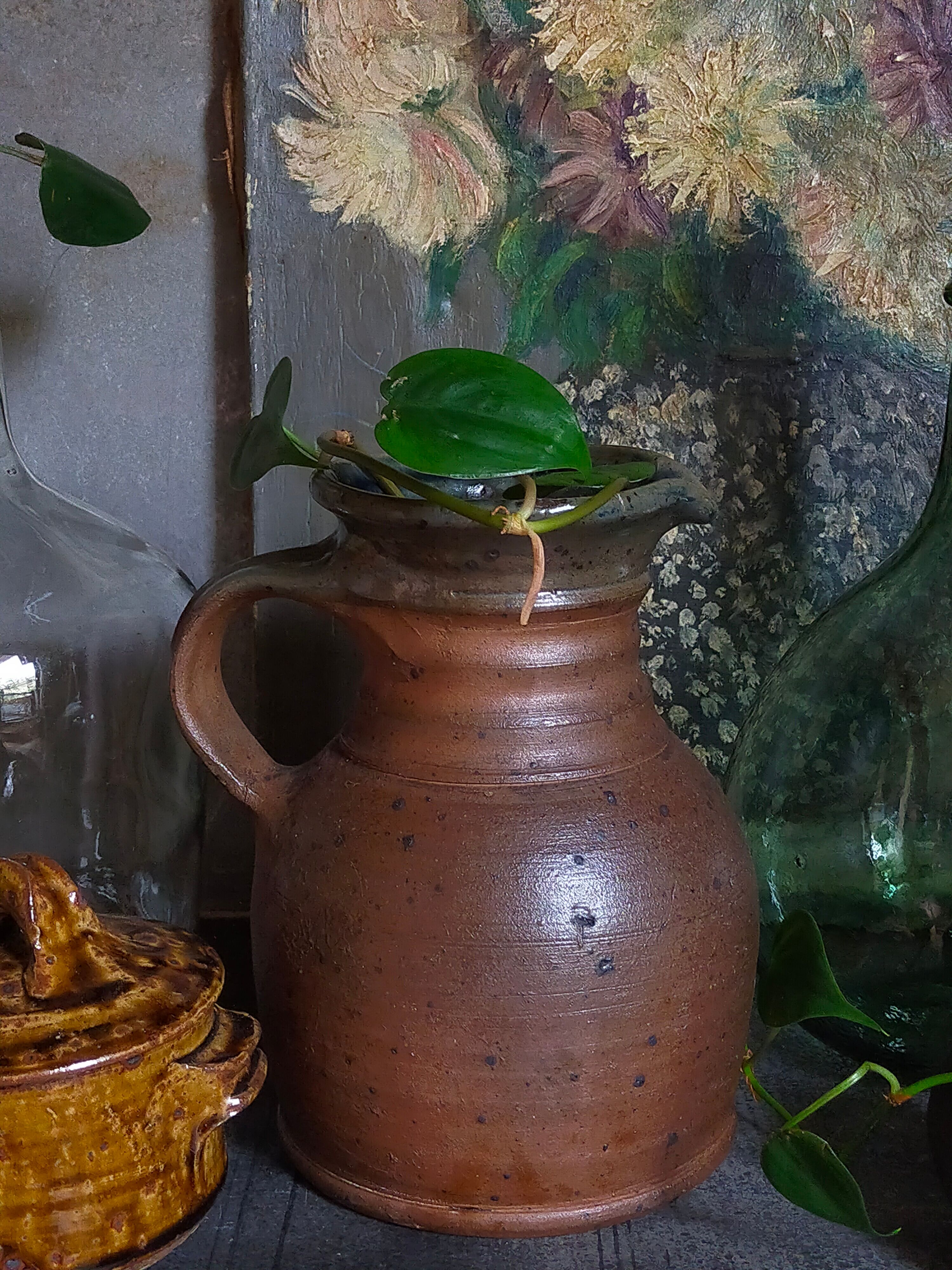 Pitcher traditional pottery Folk art in old enamelled sandstone