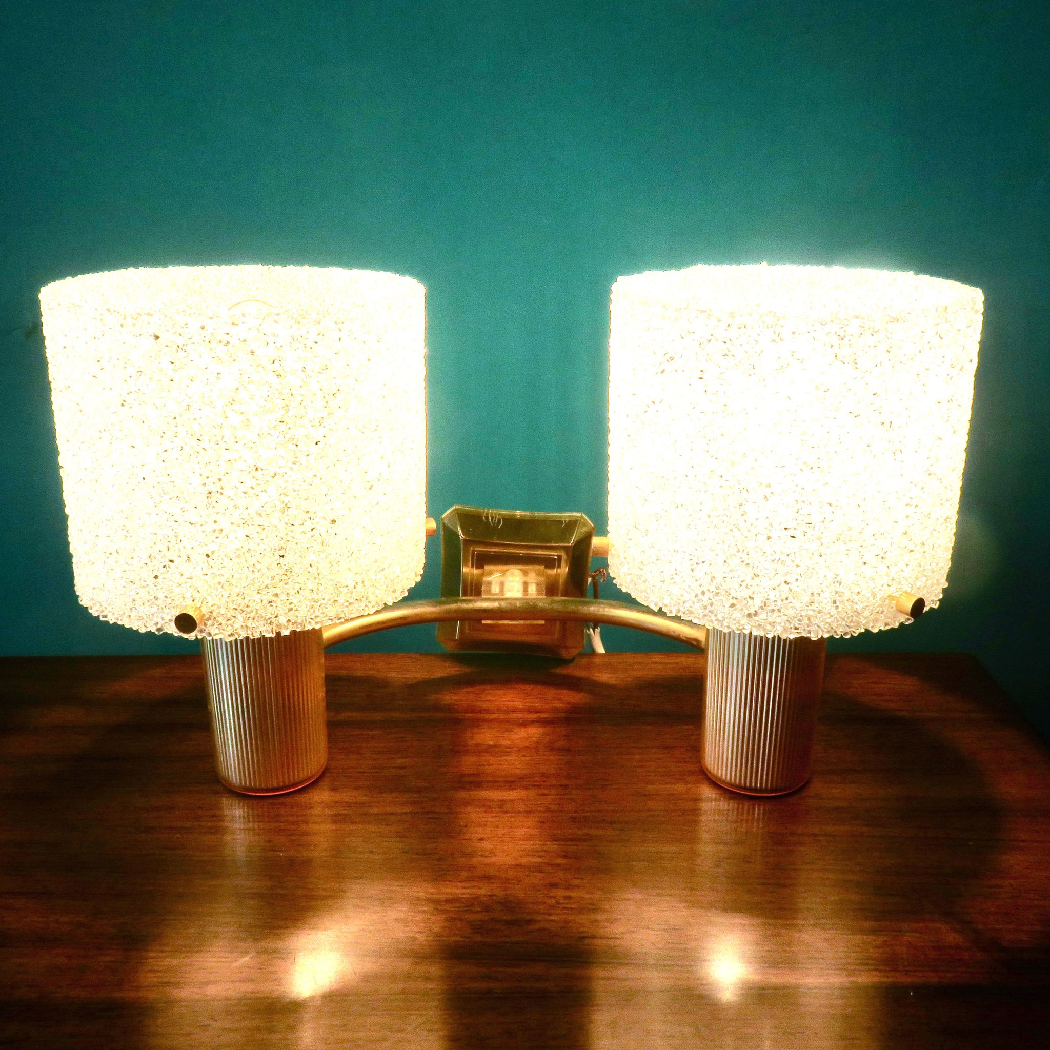 Pair of brass and gold plastic sconces with granite lampshades, France 1950