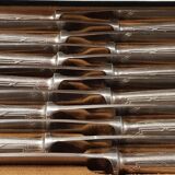 12 silver metal knives