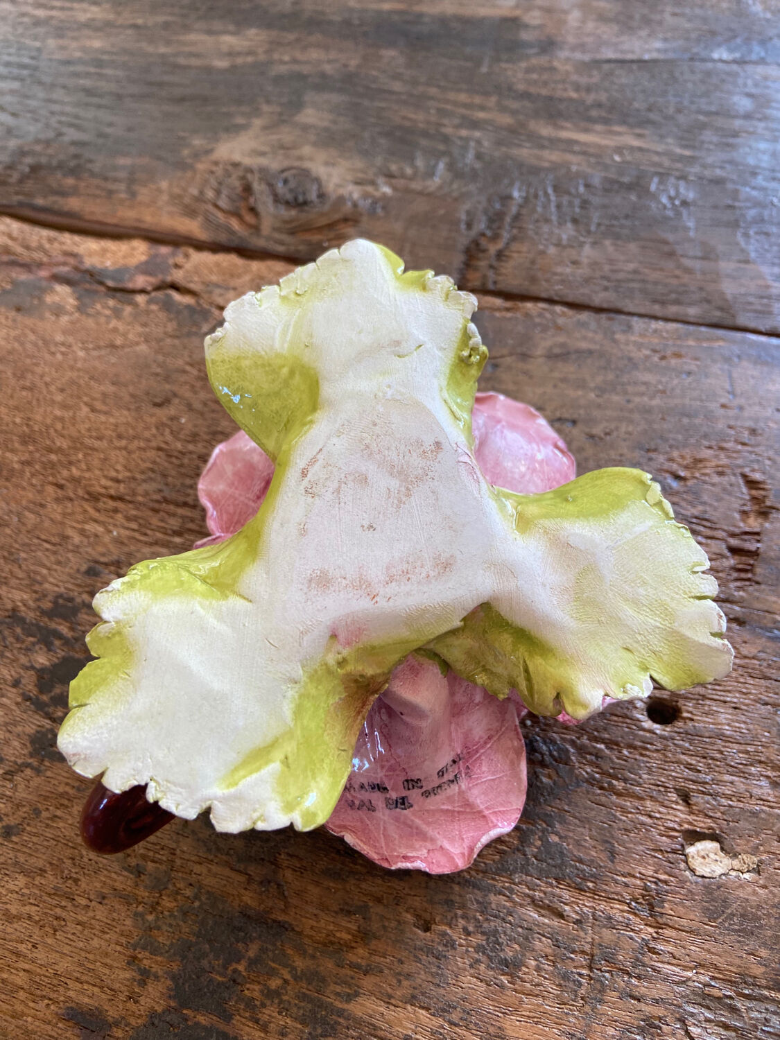 Rose-shaped earthenware candle holder