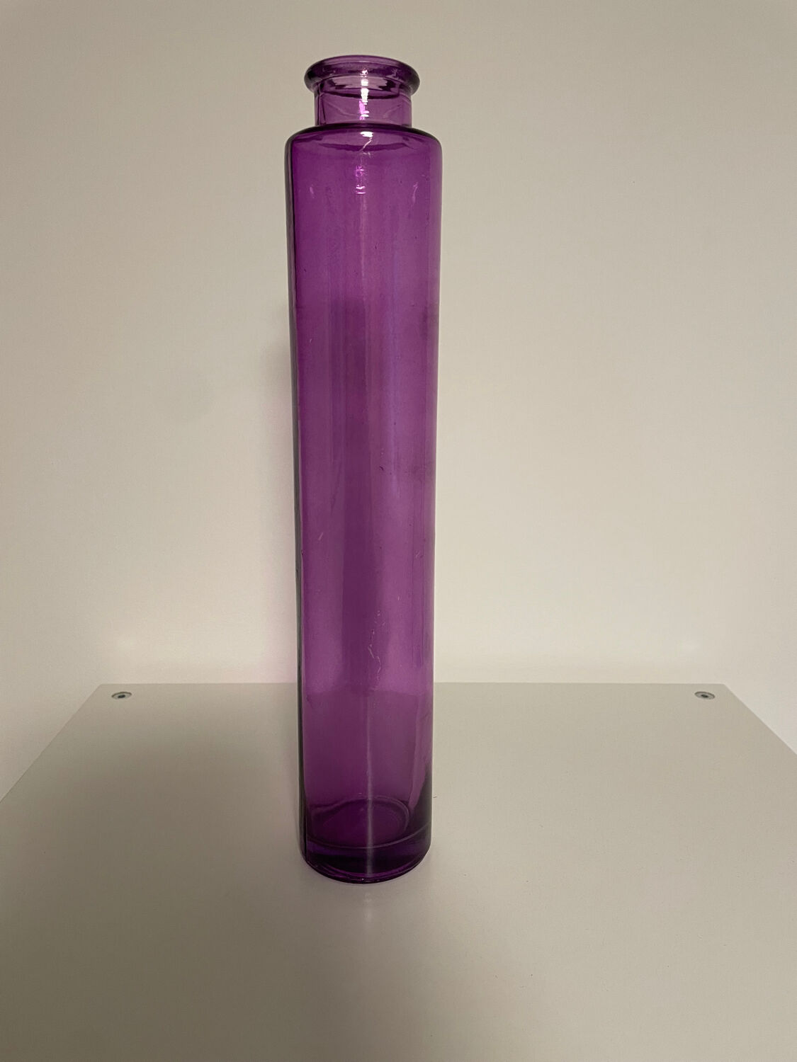 Ancient violet glass soliflore. Apothecary spirit.