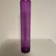 Ancient violet glass soliflore. Apothecary spirit.