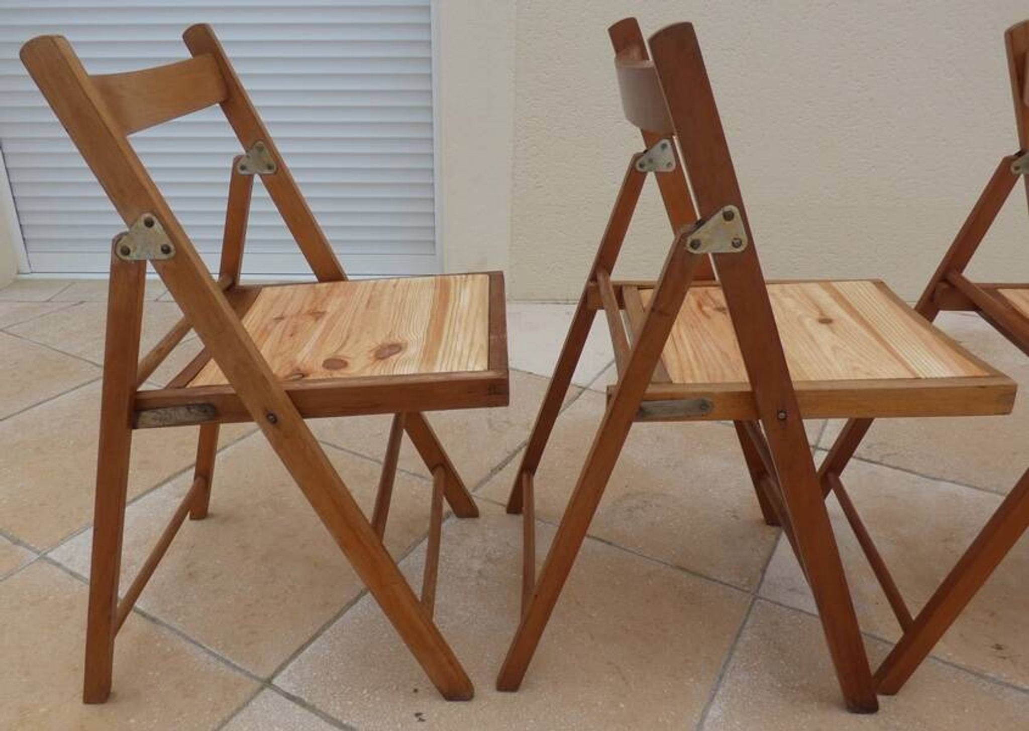 4 vintage varnished wooden folding chairs - Seats completely restored.