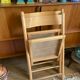 Pair of folding wooden chairs and vintage cannage
