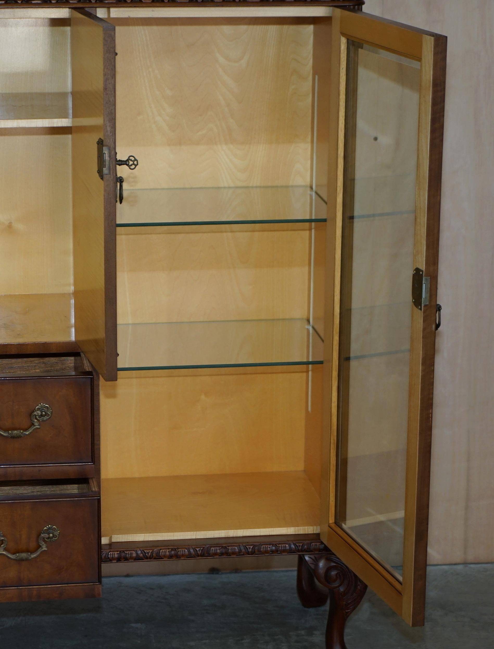 Vintage buffet display cabinet circa 1940 in flame mahogany and satinwood.