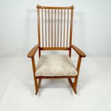 Mid-century rocking chair in pine and sheepskin by Yngve Ekström, Sweden.