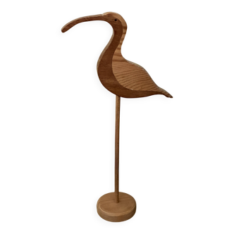 Wooden wading bird on a base