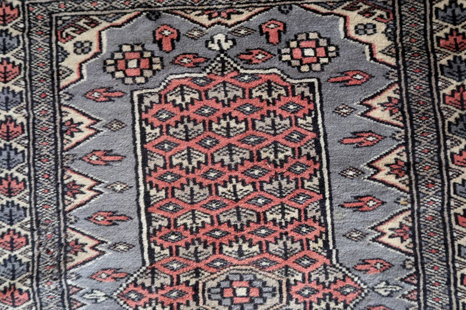 Handmade vintage Uzbek Bukhara rug 64cm x 94cm 1950s