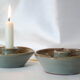 Pair of cellar rat candle holders in glazed sandstone