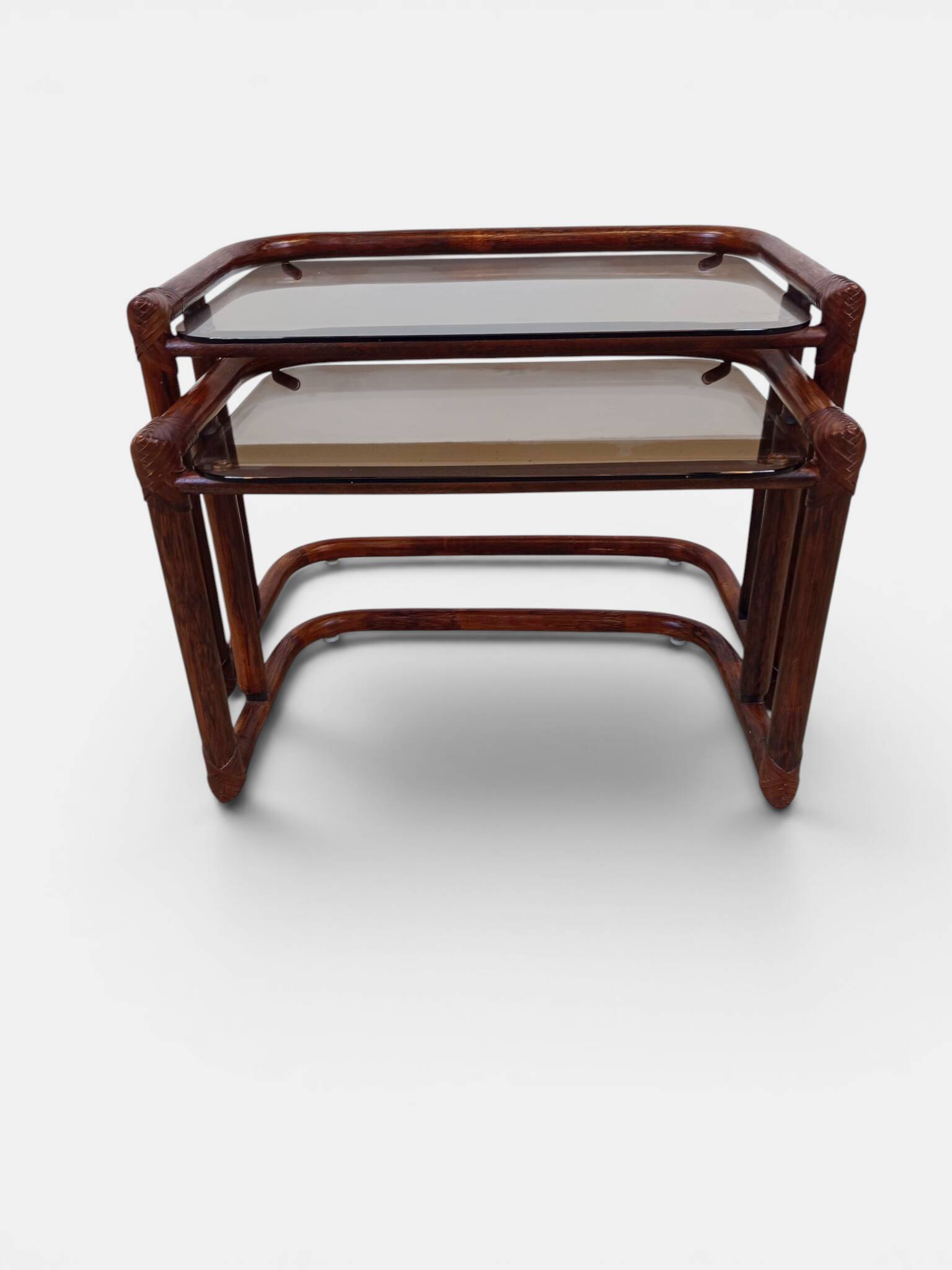 Vintage nesting tables in rattan and smoked glass by Flecht-Atelier Schütz.