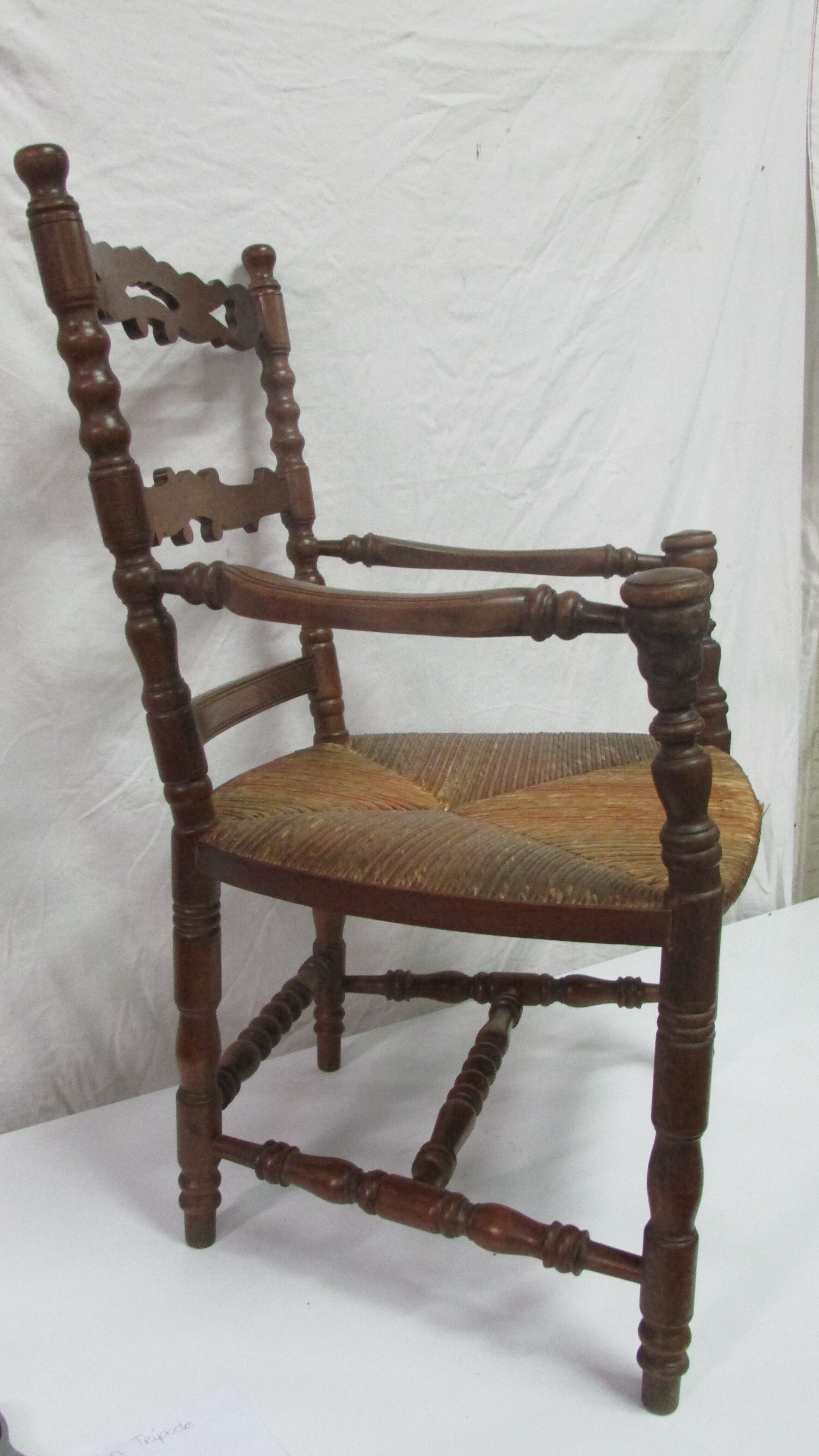 Antique armchair with armrests