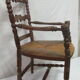 Antique armchair with armrests