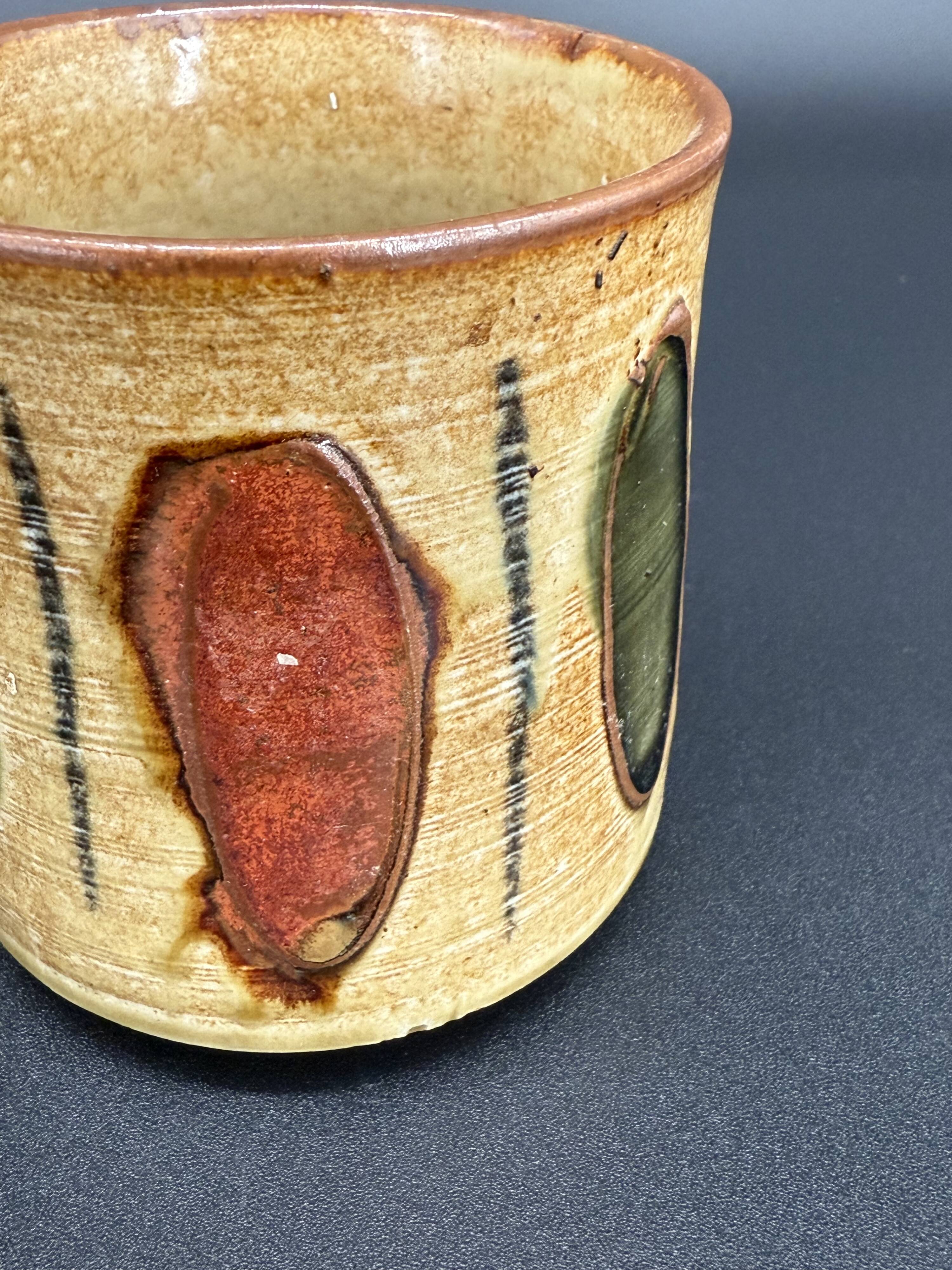 Pair of glazed stoneware mugs — abstract decor from the 70s