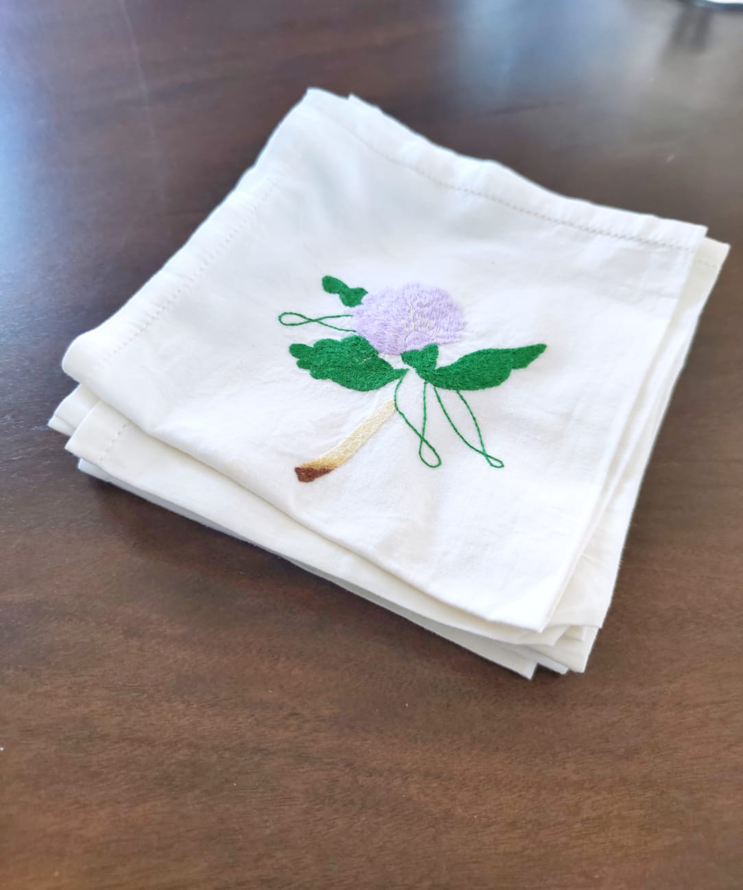 11 hand-embroidered antique table towels