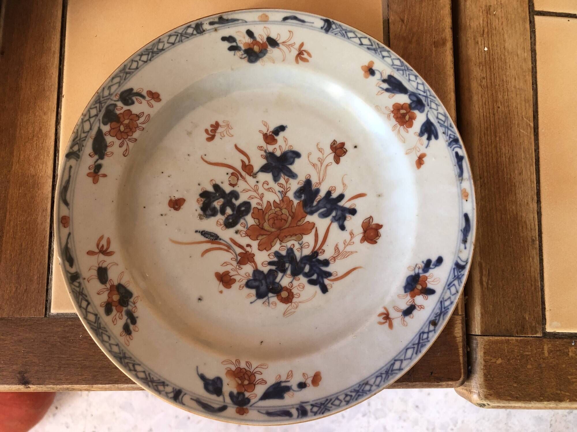 China plate porcelain xviii compagnie des indes orange blue flower decoration